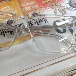 2 Michael Kors jackets and last of all a pair of FIRE GUCCI GLASSES